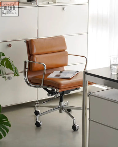 Tan leather office chair with chrome frame and five-wheel base marley office chair with swivel and height adjustable