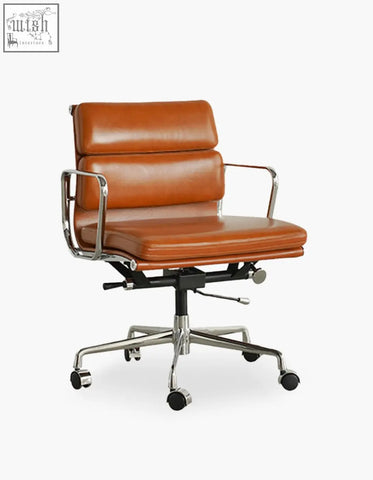 Tan leather office chair with chrome metal frame and five-star base perfect for a stylish leather office setup