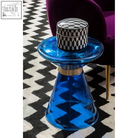 Marlo large black and white geometric print ceramic trinket box on blue glass side table with gold accent