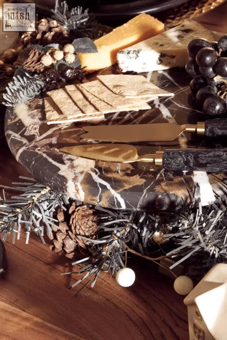 Black and gold marble cake stand with elegant knife set perfect for serving marble cake or desserts