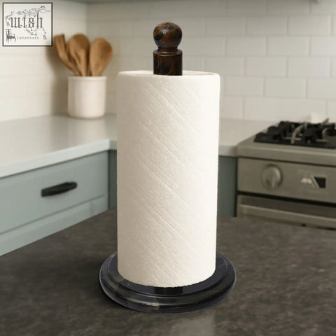 A sleek dark brown marble kitchen roll holder with a glossy black acrylic base and top knob for stylish use
