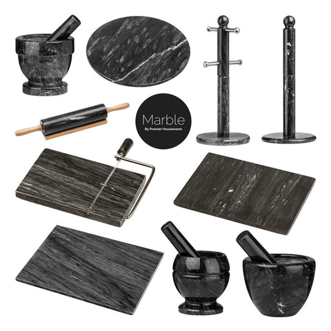 Black marble rolling pin with wooden handles featuring a polished veined surface and sleek modern design elements