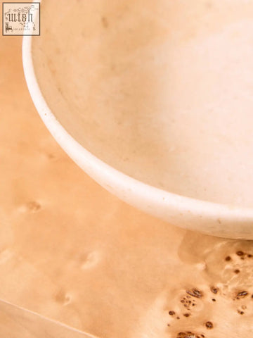 Cream-colored marmore cream marble bowl with smooth textured interior and subtle speckles perfect for serving