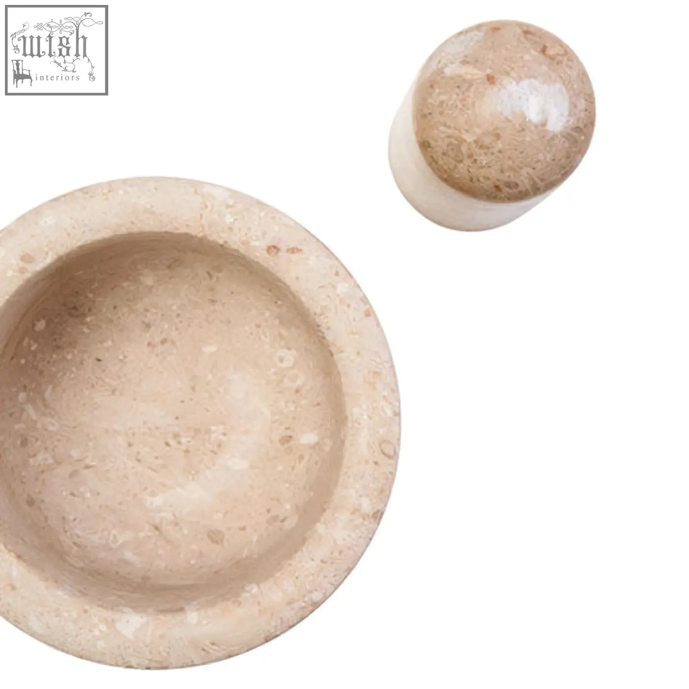 Beige stone mortar and pestle set with textured speckled surface made from marmore cream marble material