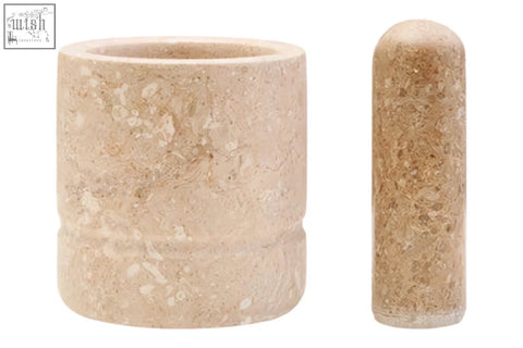 Beige stone mortar and pestle set in marmore cream marble perfect for grinding spices and herbs at home