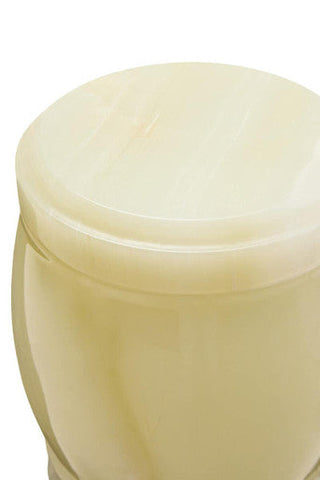 Cream-colored ceramic marmore onyx storage jar with smooth surface rounded lid and subtle vertical ridges