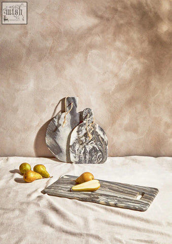Gray and white marbled marmore rectangular black marble chopping and serving board with sleek modern design