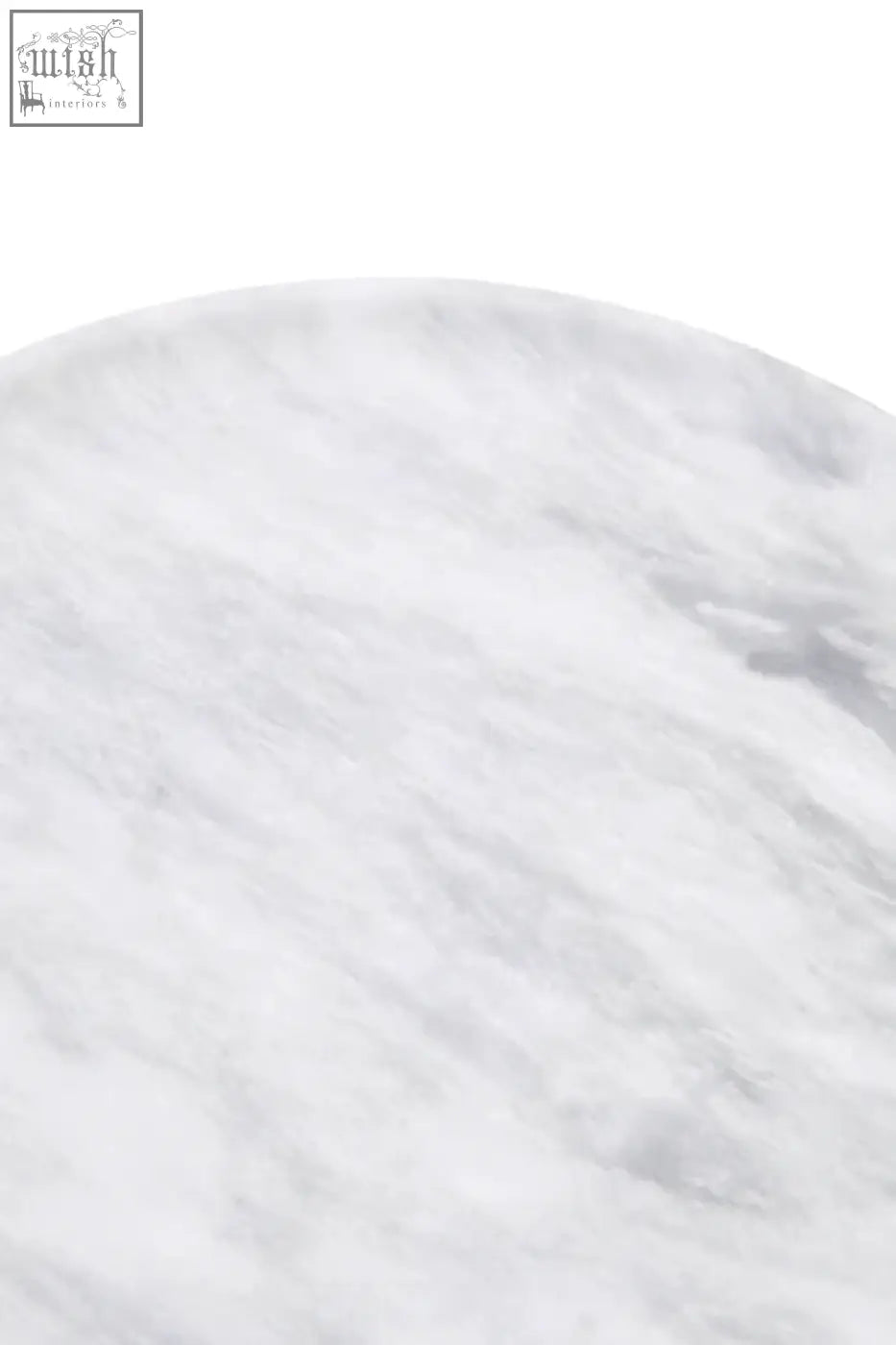 A marmore round marble plate with a circular white marble surface featuring subtle gray veining