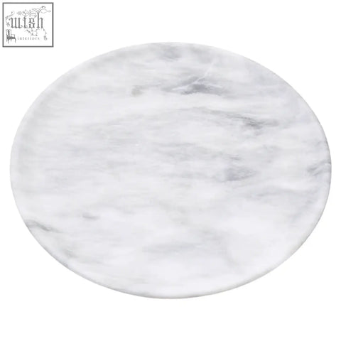 White marble marmore round marble plate with subtle gray veining perfect for serving and presentation