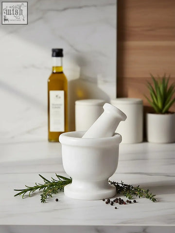 White ceramic mortar and pestle set in marmore white marble style for grinding with a sleek white marble mortar design