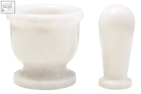 White marble mortar and pestle set made from marmore white marble for grinding and crushing spices