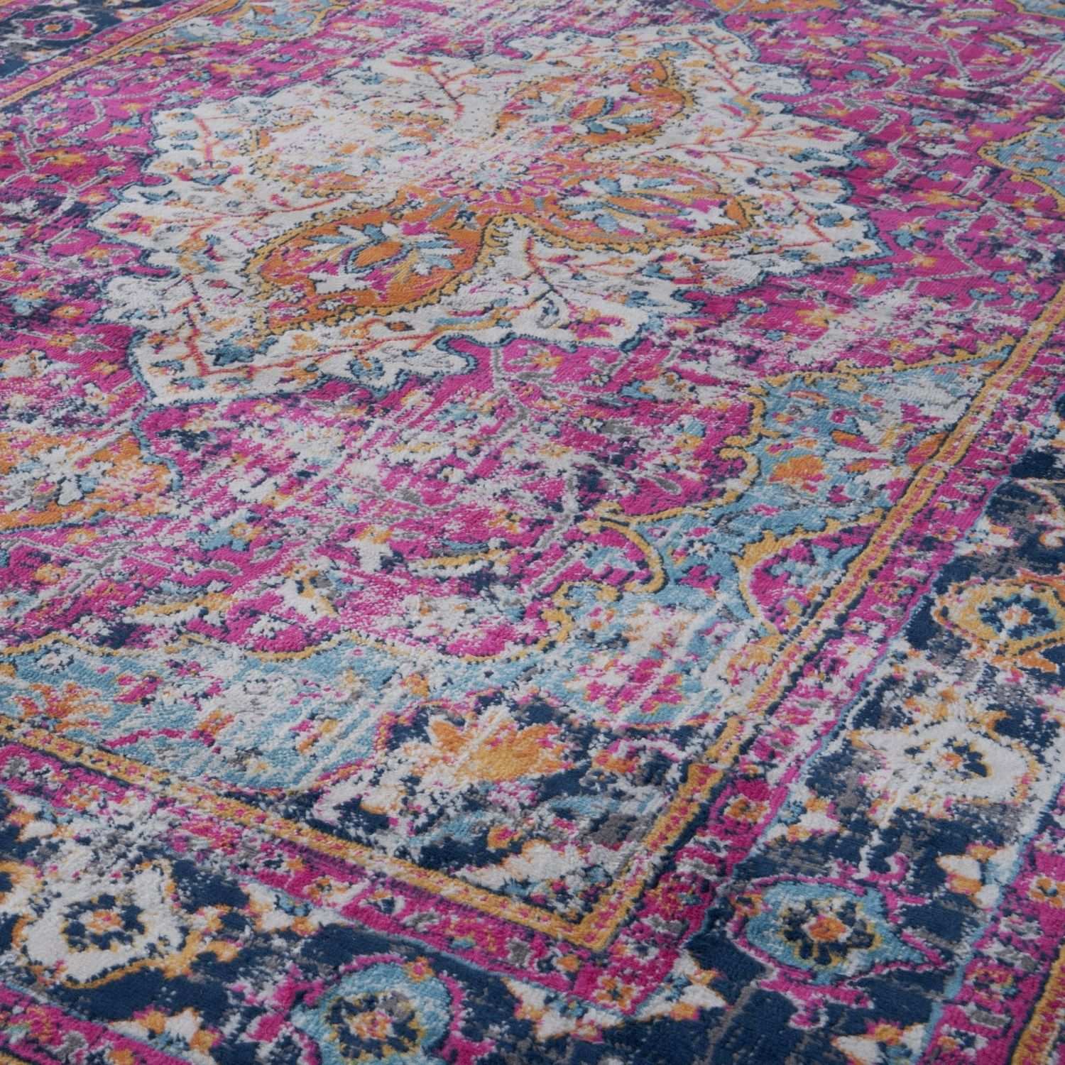 Vibrant pink and navy blue marrakech vintage rug with intricate gold floral patterns perfect for stylish spaces