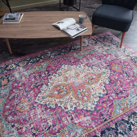 Vibrant pink and teal marrakech vintage area rug with intricate floral patterns perfect for adding color and style