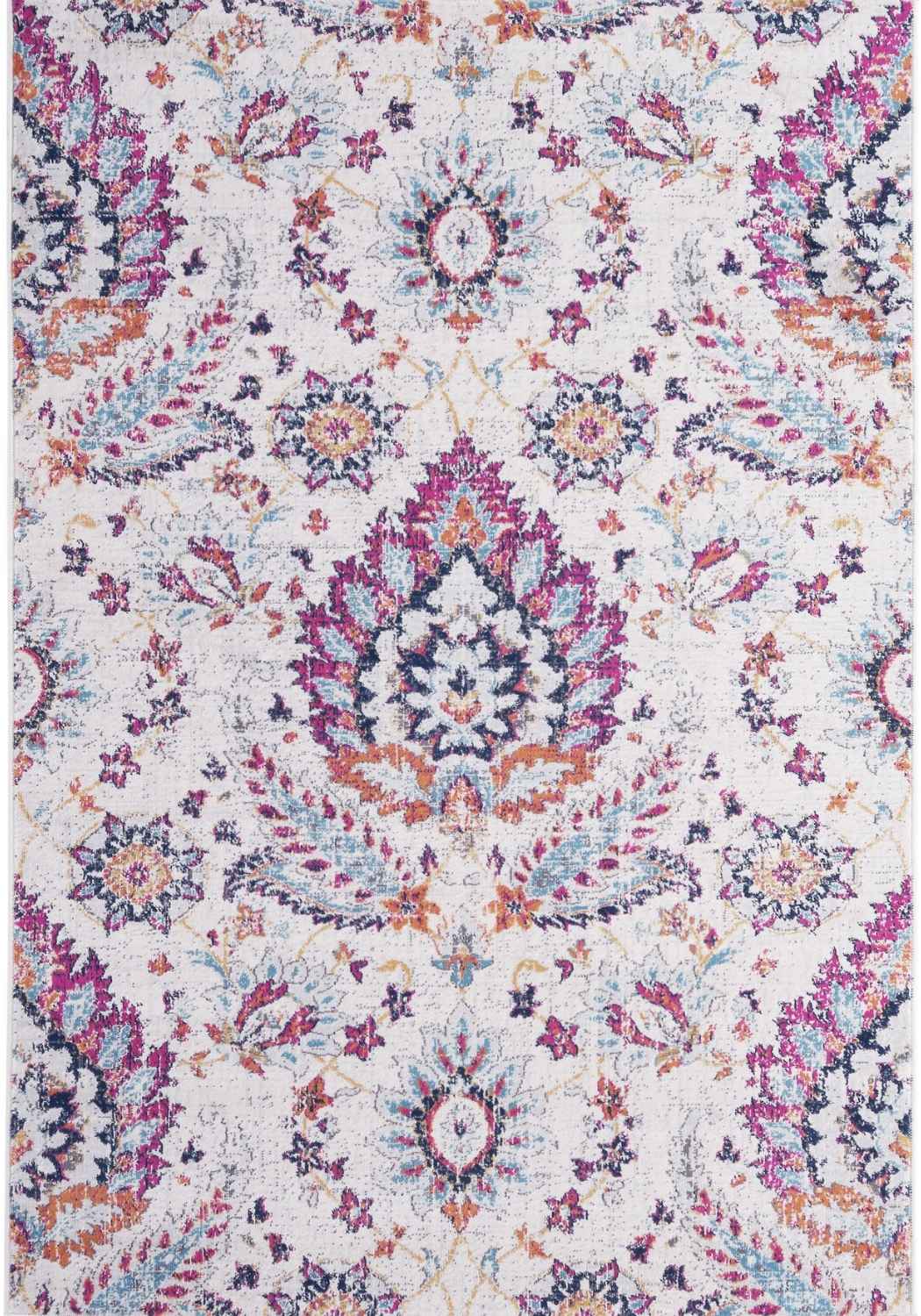 A marrakech vintage rug featuring a faded floral and paisley design in pink purple teal and cream on off-white background