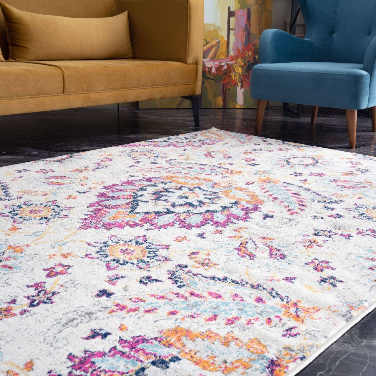 Vibrant marrakech vintage rug with distressed floral medallion in pink orange and teal on off white background