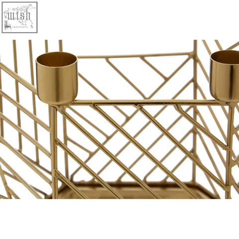 Gold metal hexagonal candle holder with geometric lattice design and two cup holders for hexagonal candles