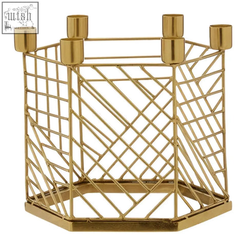 Gold-toned hexagonal candle holder with six cylindrical cups perfect for stylish candle display