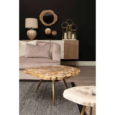 Medium hurricane lamp with handle on round coffee table featuring white marble base and gold metal legs