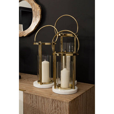 Gold-toned martina medium hurricane lamp with clear glass panels white marble base and handle for easy carrying