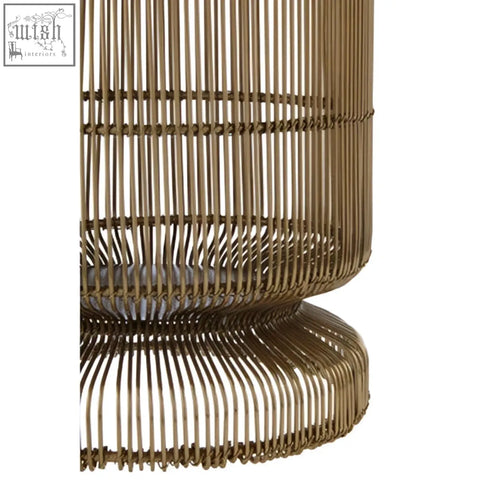 Gold-toned martina small wire candle holder with cylindrical shape and woven wireframe design for wire candle use