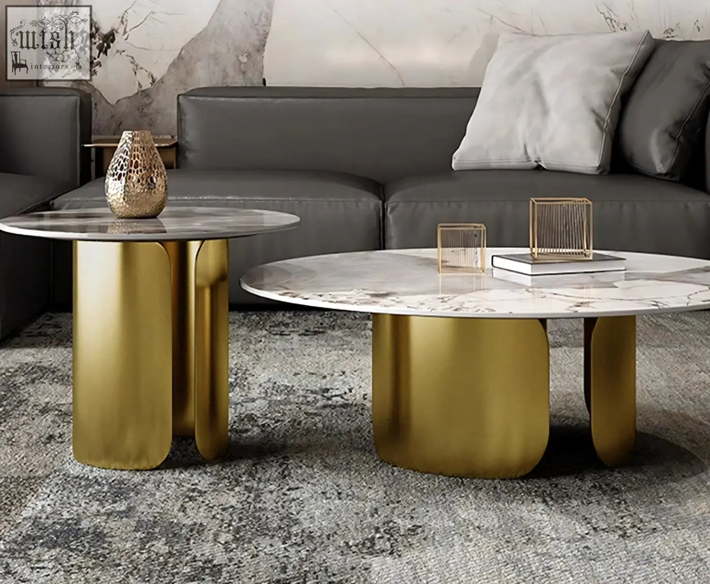 Two modern nesting coffee tables with polished sintered stone tops and sleek gold metal bases from maru set