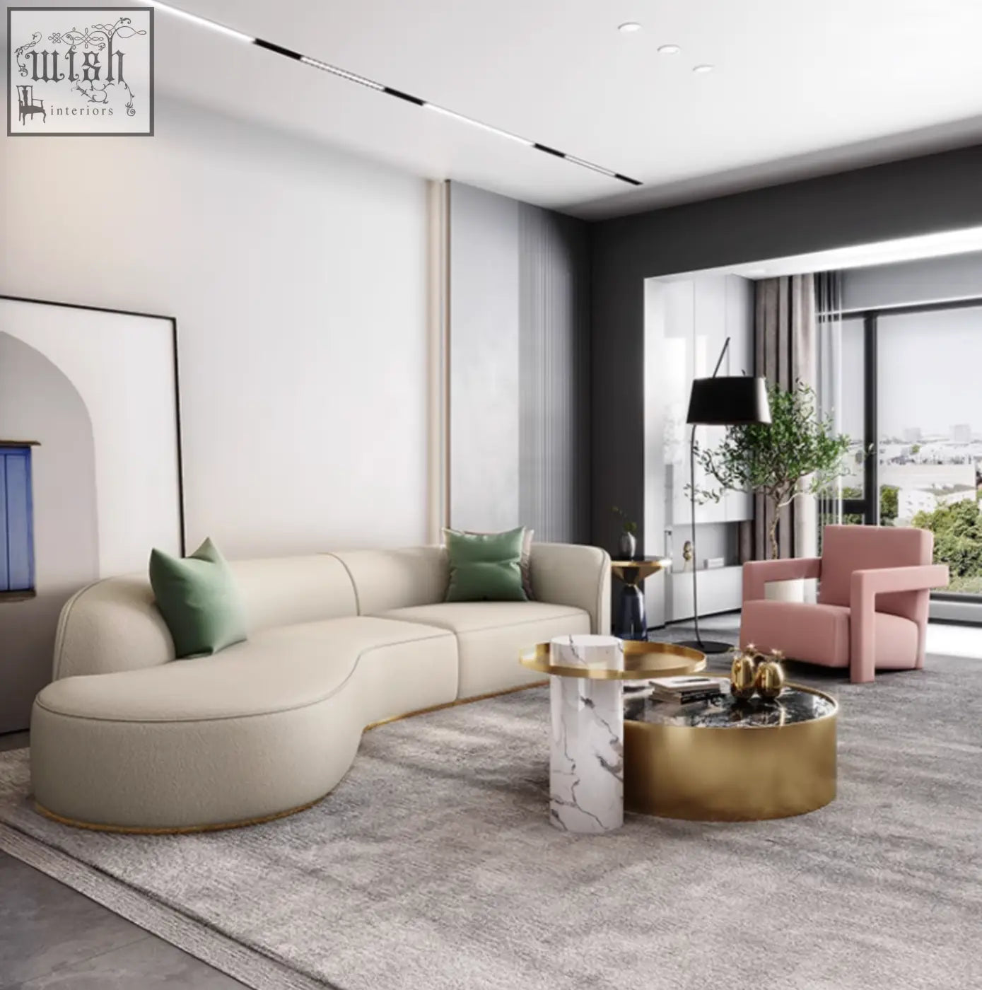 Cream-colored curved sectional sofa with green accent pillows and gold-trimmed base beside marble coffee table set