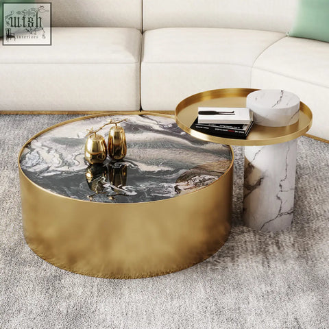 Gold finished round coffee table with black and white marble top perfect as a stylish marble coffee table centerpiece