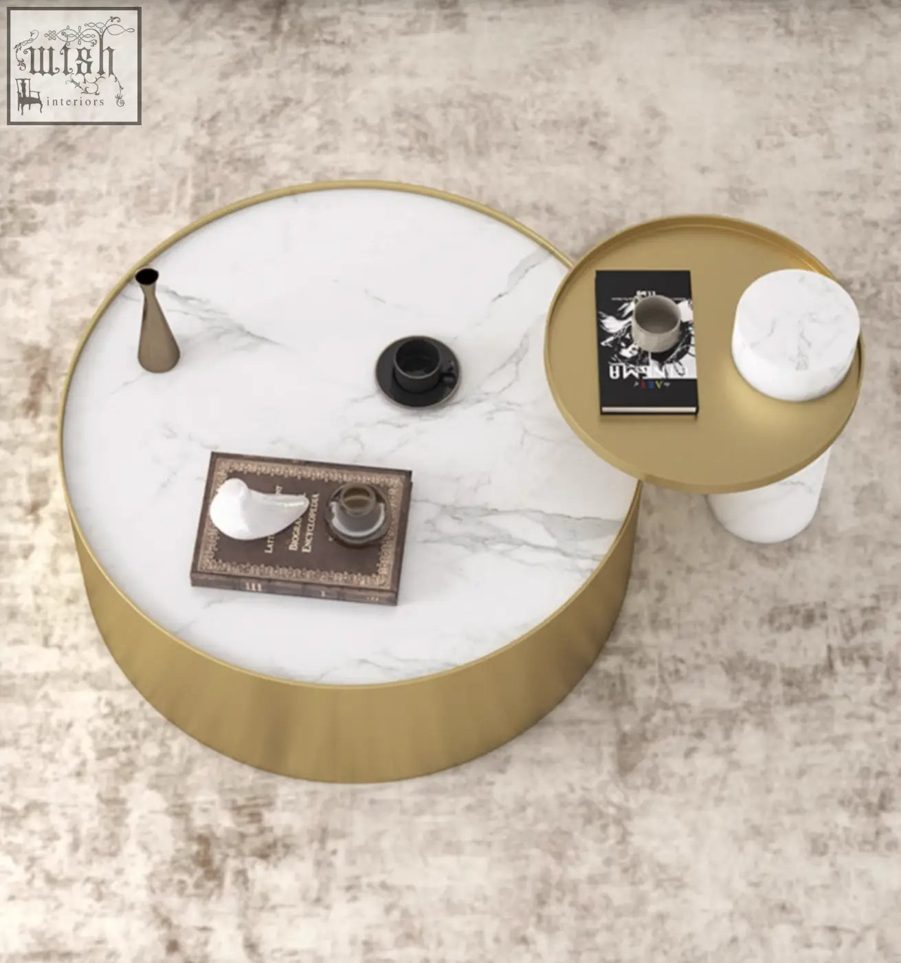 Gold-framed round marble coffee table with white marble top featuring gray veining from mason marble set