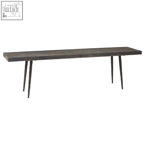 Dark gray wood bench with slender black metal legs made from oak wood for stylish seating and storage