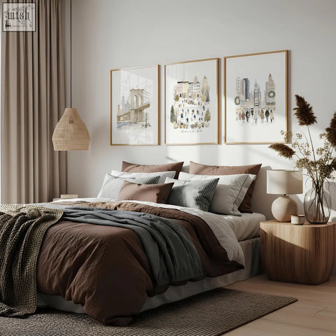 Cozy brown and gray layered bedding with textured knit throw paired with winter in new york master bedroom wall art prints