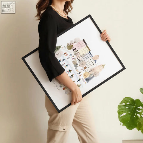 Black-framed illustrated cityscape wall art prints in soft pastel and earthy tones perfect for master bedroom art above bed