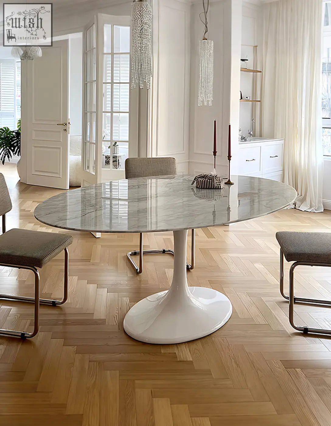 White marble oval dining table with sleek pedestal base ideal for modern oval dining spaces masuda oval dining table