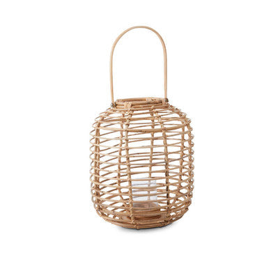 Mataram tall natural rattan lantern with curved handle and clear glass interior for cozy lighting