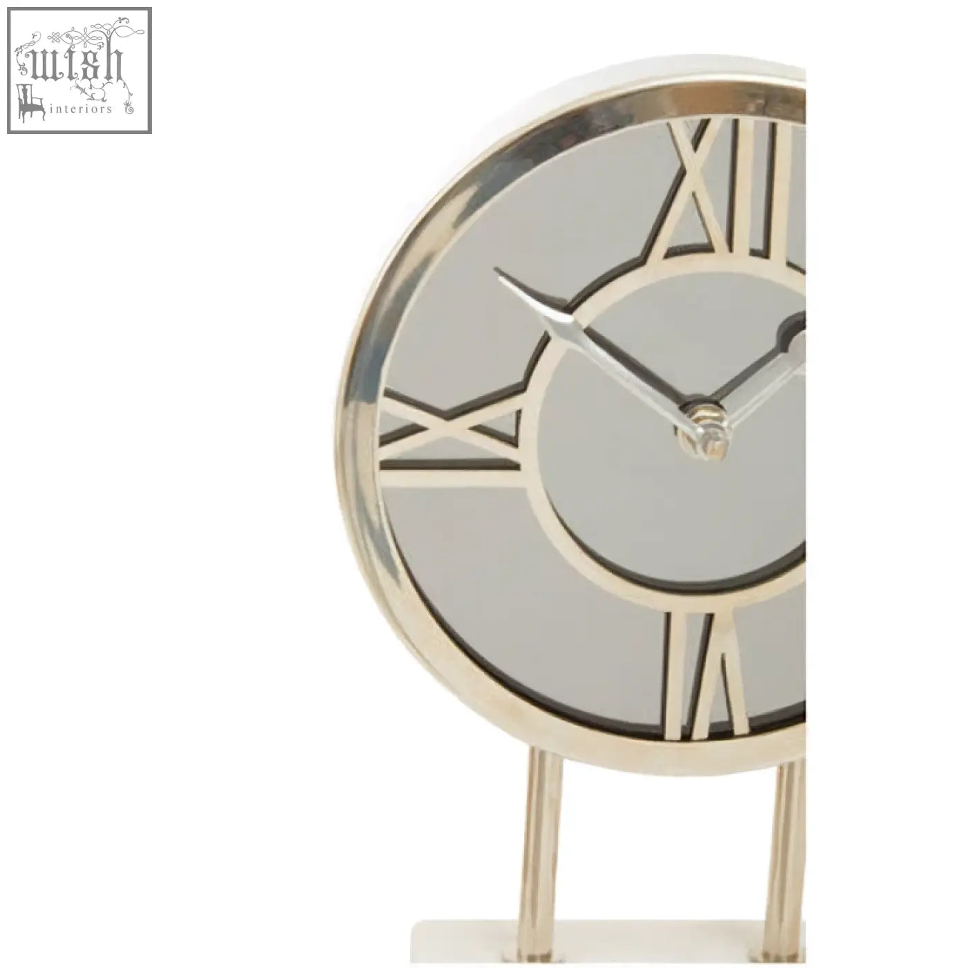 Silver-toned table clock with mirrored face and roman numerals on a white marble base for elegant decor