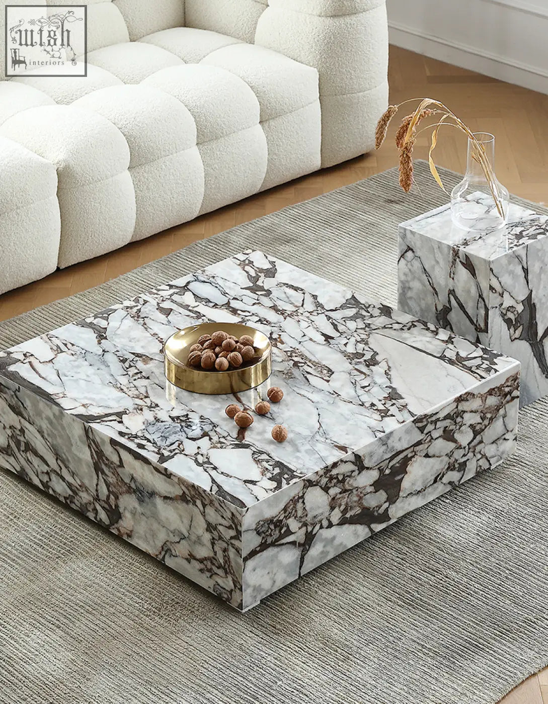 Matteo square coffee table with white and black marble top and sides featuring modern geometric design