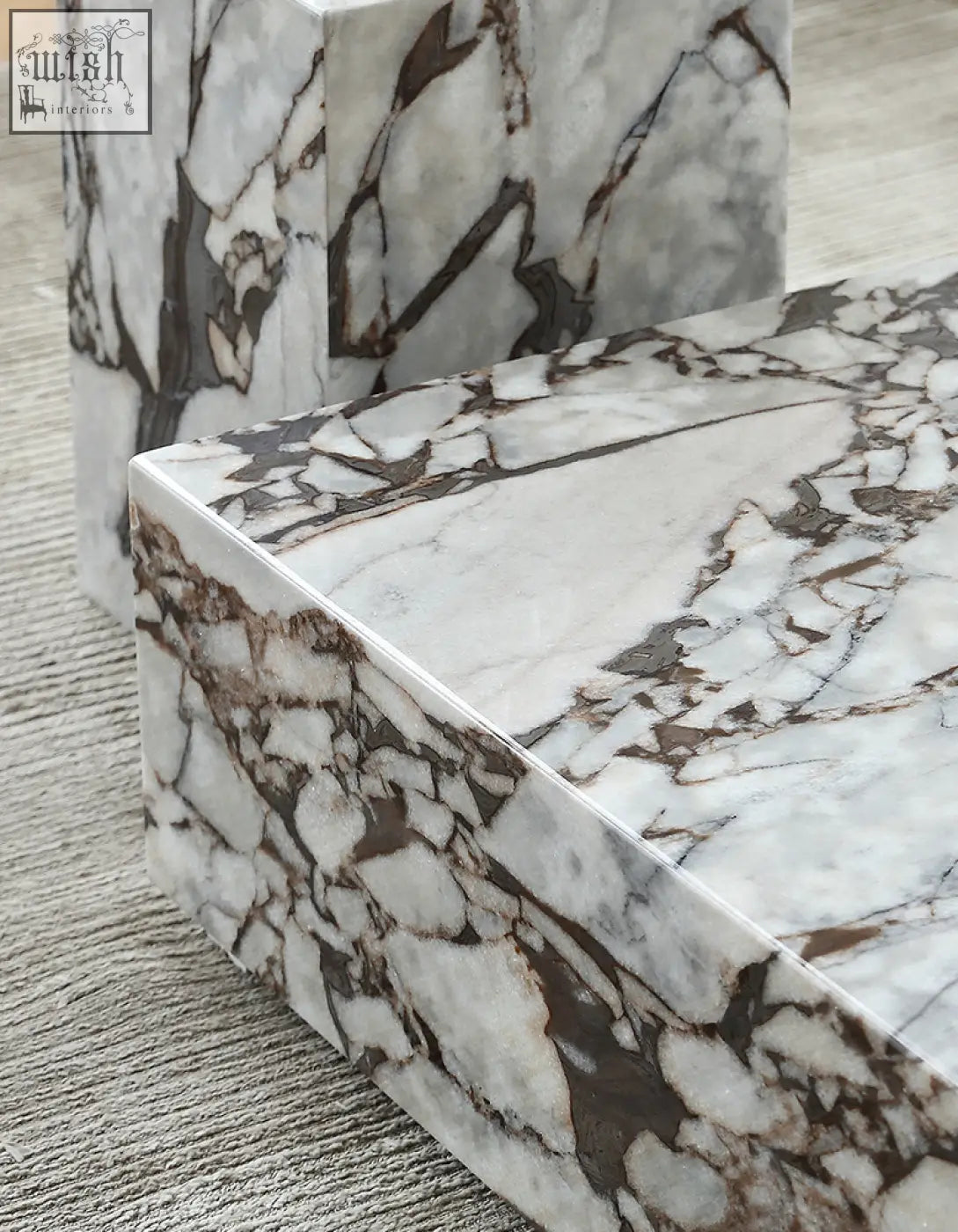 Matteo square coffee table featuring white and brown veined marble with a polished geometric design square coffee table