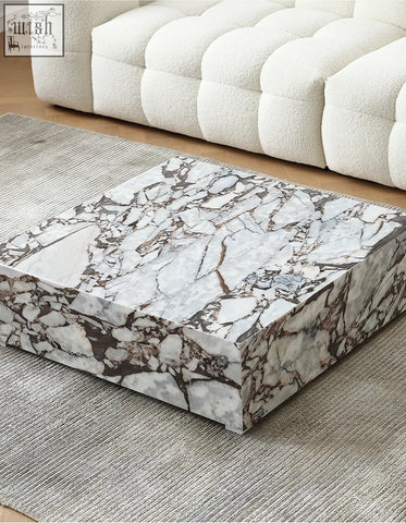 Matteo square coffee table with white and gray marble top featuring bold dark brown and black veining