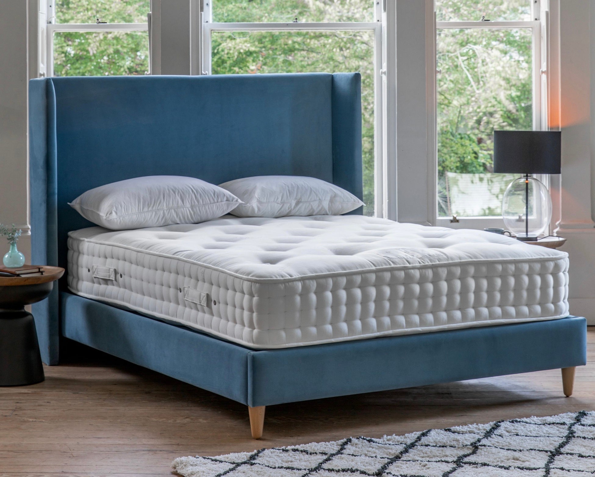 Blue velvet bed frame with white quilted mattress for mattress luxury 4000 springs showing item width depth height