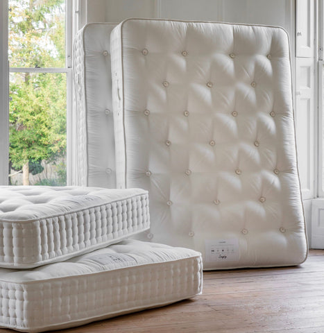 White tufted mattress with button detailing and quilted edge for mattress luxury 4000 springs item width and depth