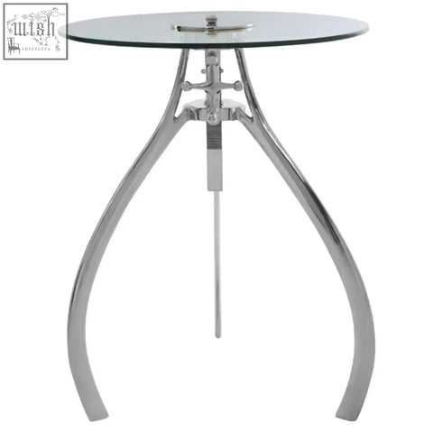 Maxi crank mechanism adjustable table with a sleek round glass top and chrome prong-shaped metal legs