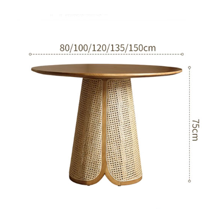 Maya dining table with a smooth warm wood top and woven rattan base featuring vertical slats for dining use