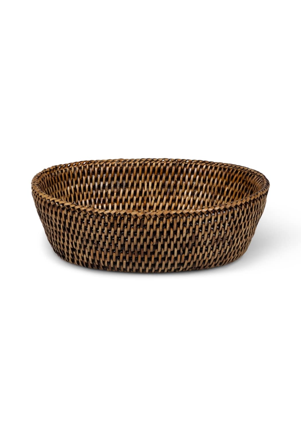 Brown woven oval mayfair rattan hold all basket with tight weave and slightly raised rim for versatile storage