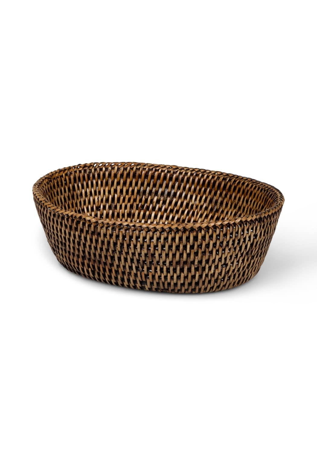 Brown woven Mayfair rattan hold all basket with tight uniform weave and slightly raised oval rim