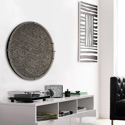 Circular maze board wall game with dark gray maze pattern, metallic frame, target area, and ball holder for fun play