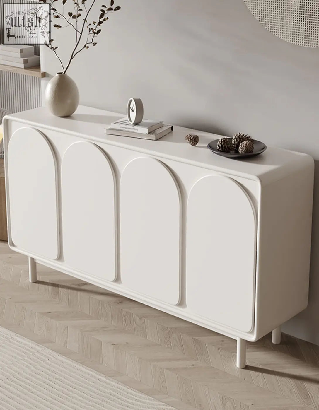 White mediterranean style sideboard with cream finish four arched doors and slender legs perfect for stylish storage