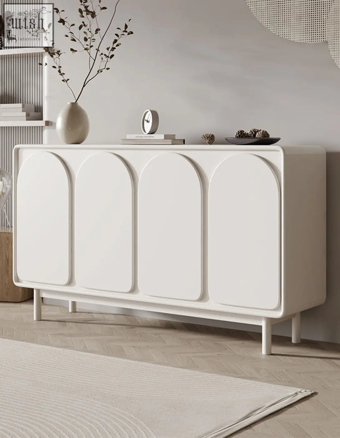 White mediterranean style sideboard with four arched doors and slender legs in cream finish