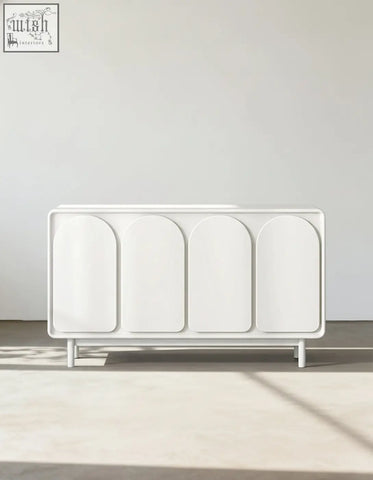 White modern mediterranean style sideboard with four arched cream doors and slender legs perfect for stylish storage