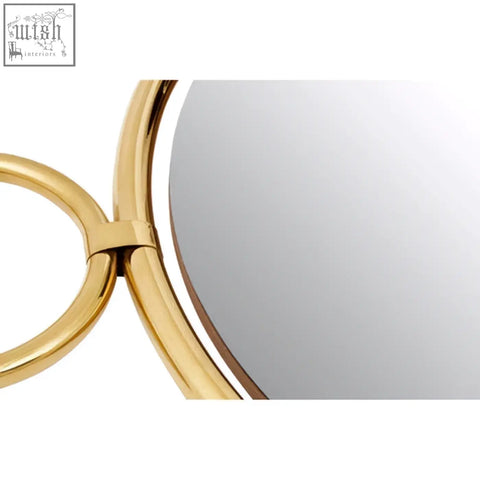 Meissa gold finish pendant wall mirror with gold-toned circular design and two sleek interlocking rings in pendant wall style