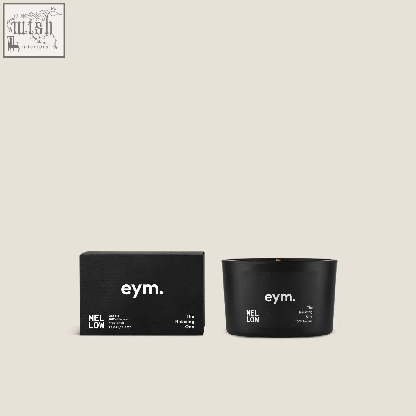 Black cylindrical mini candle mellow with minimalist white branding the relaxing one in a matching black box