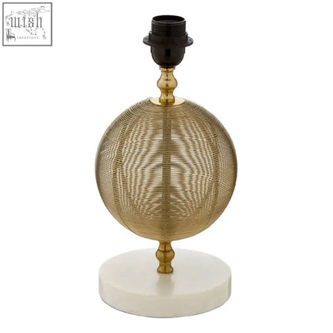 Melora round marble gold finish table lamp base with gold mesh globe, black bulb socket, and white marble gold finish base